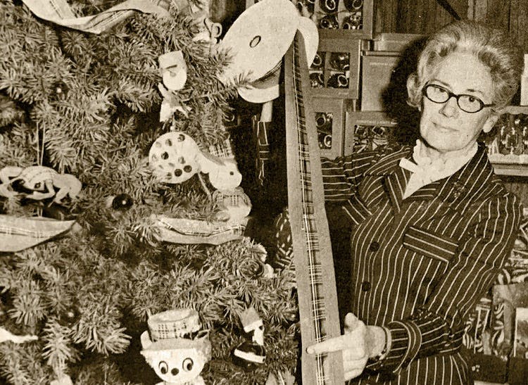 Decorating our in-store Christmas tree in the mid-20th century
